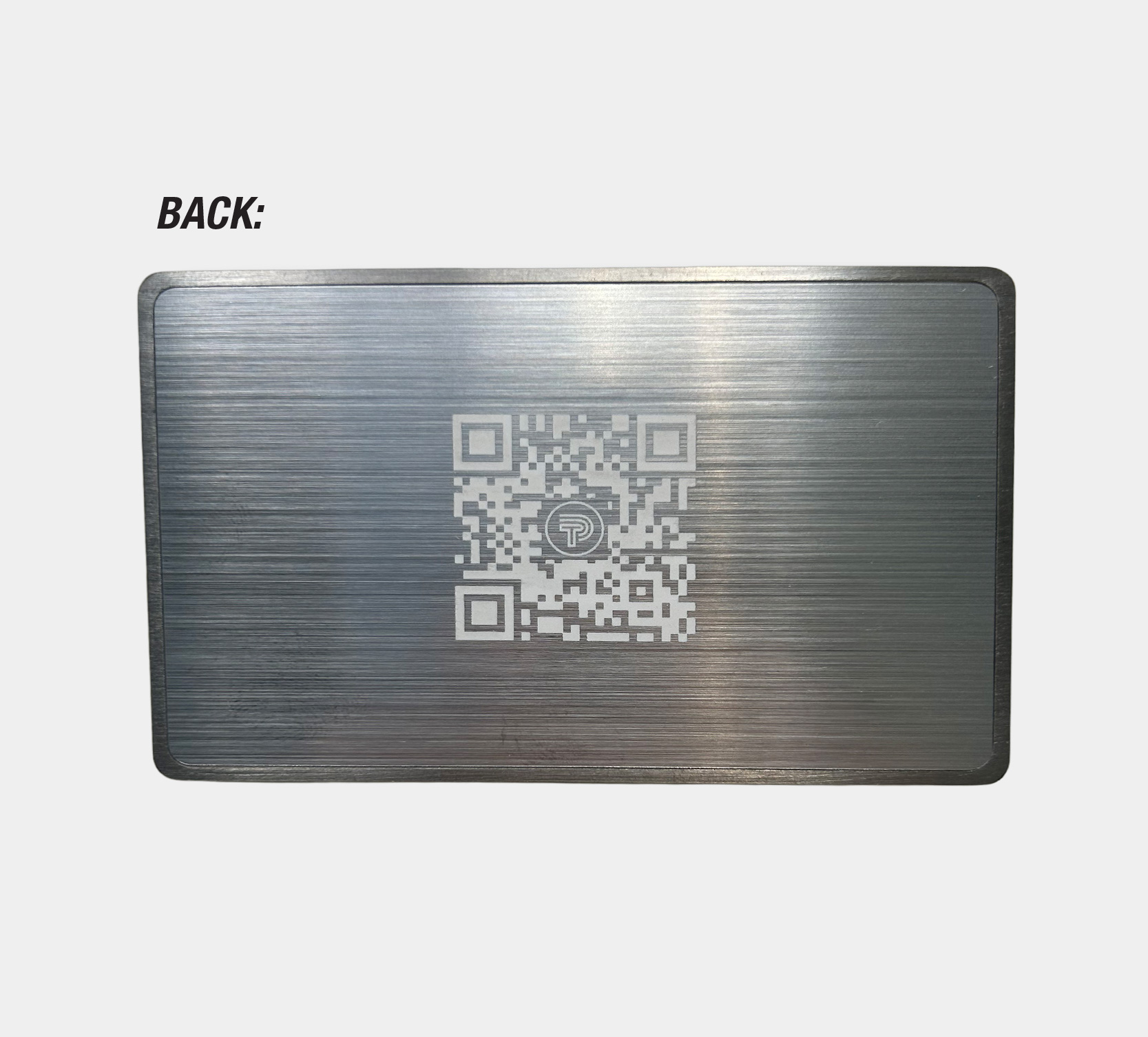 Image showing back of silver metal NFC business card with QR Code laser engraved