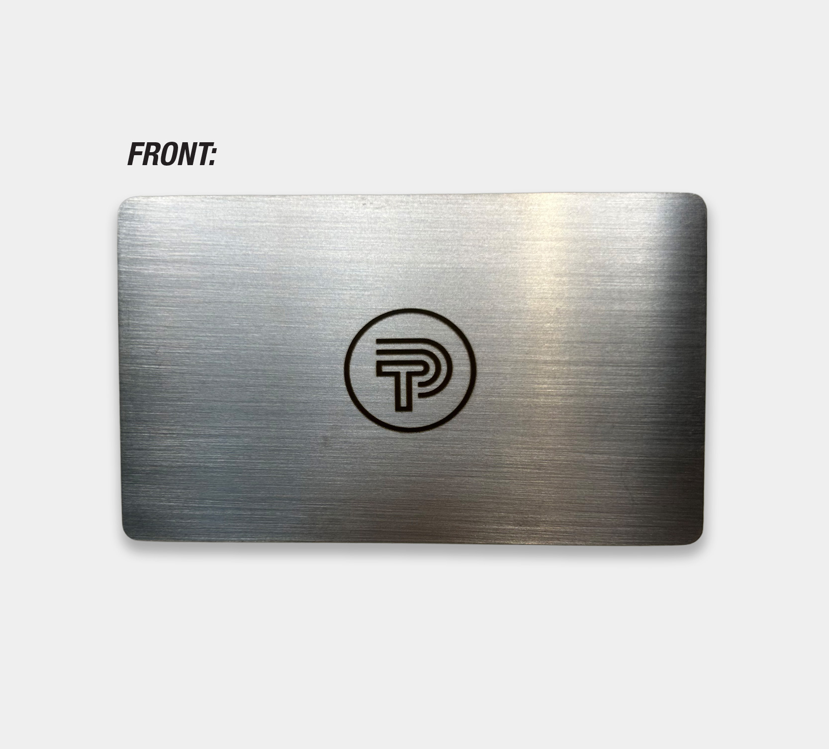 Image showing front of silver metal NFC business card with Tap Ping Logo engraved with black