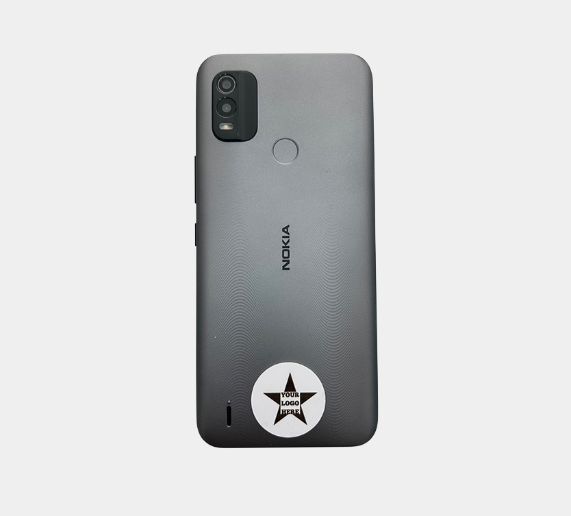 White NFC Enabled Sticker with custom Logo on back of a grey Nokia mobile phone case