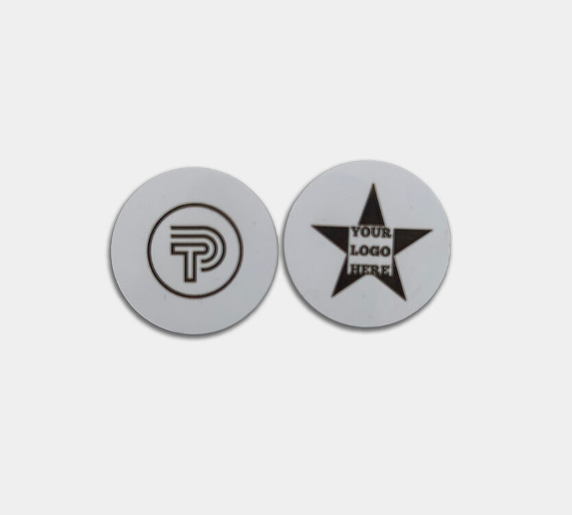 Two White NFC Enabled Sticker with custom Logos. Tap Ping Logo and Star